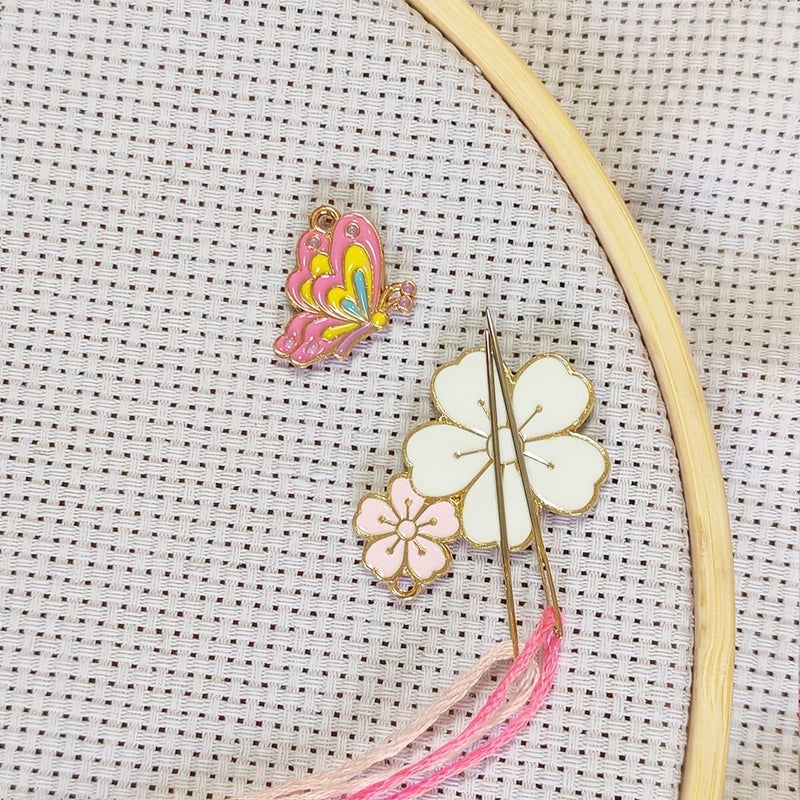 ESWEUOOM 2 Pieces Pink Flower Butterfly Needle Minders, Cute Women Magnetic Needle Nanny Keeper, Cute Cross Stitch Embroidery Needlepoint Needlework Accessories Set for Sewing Needle and Pin Holders (Pink) - Image 1